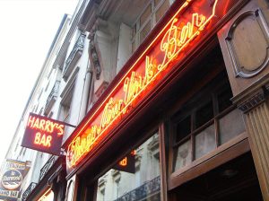 The red neon sign of Harry's New York Bar in Paris