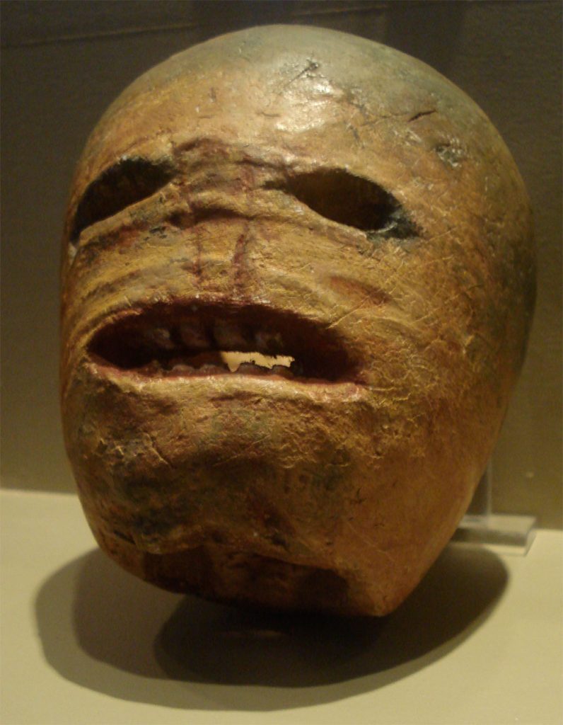 A carved turnip jack-o'-lantern from early 20th-century Ireland